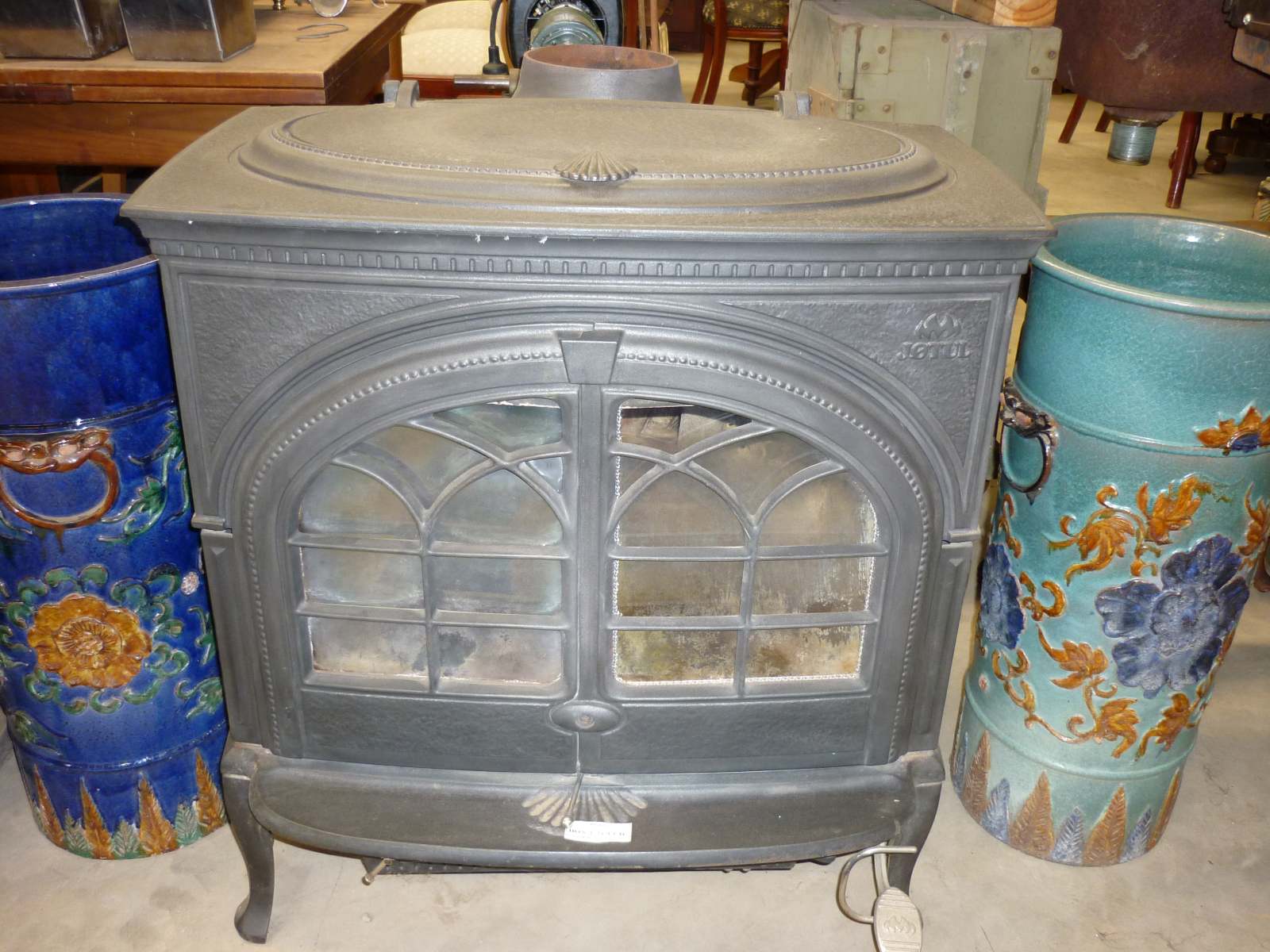 Jotul Slow Combustion Cast Iron Fireplace with Double Doors. Top Opens with Foot Pedal