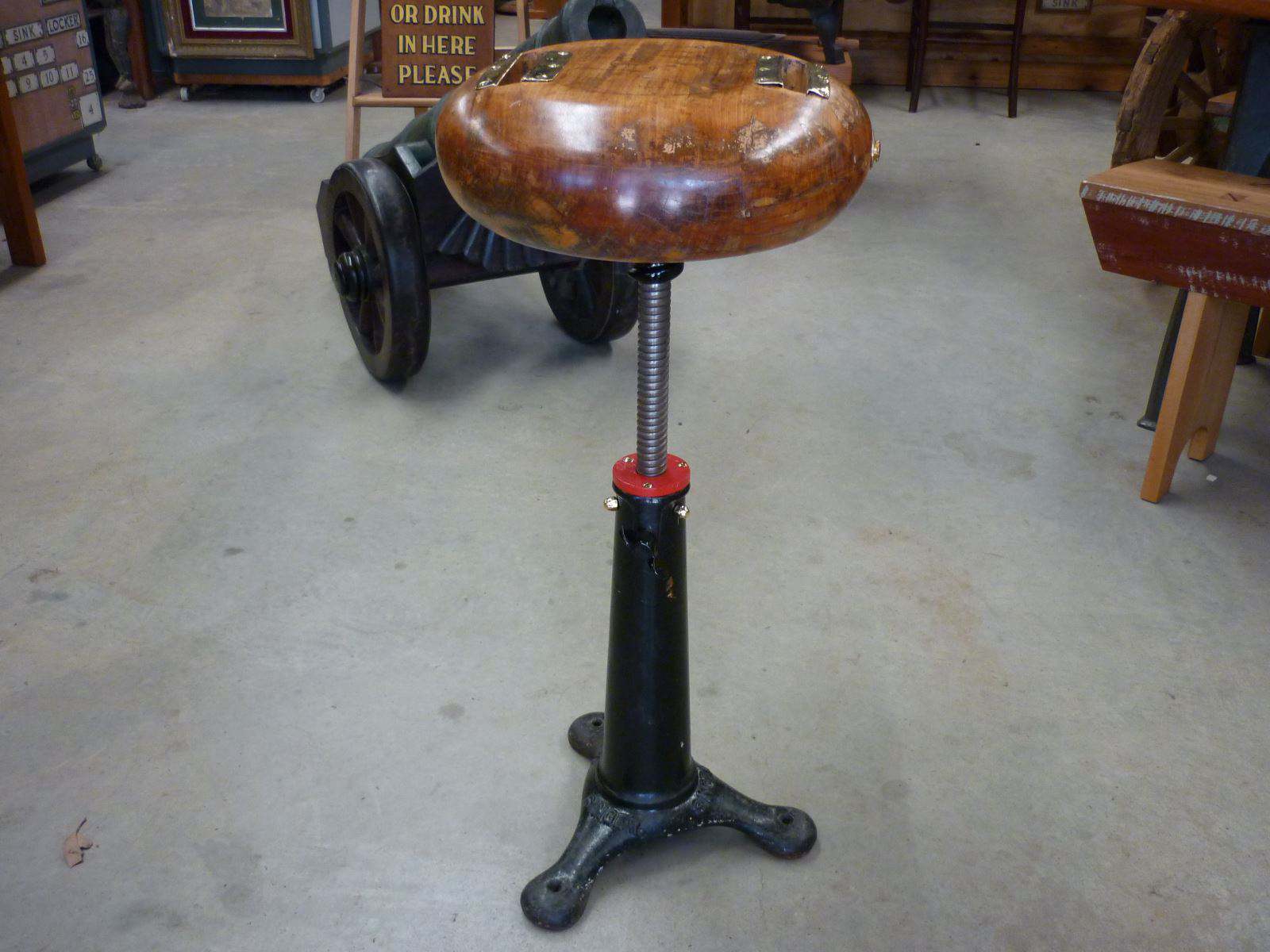 Stool. The Seat is a Ships Mast Top, Qld Maple 19th Century on a Singer Cast Iron Base